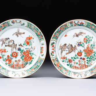 A pair of Chinese famille verte 'Birds Among Flowering Branches' plates, Kangxi