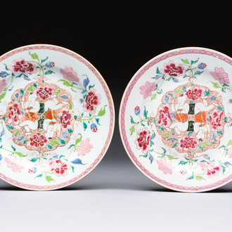 A pair of Chinese famille rose 'He He Er Xian' plates, Yongzheng/Qianlong