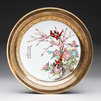 A Chinese famille rose gilt-decorated dish with birds among blossoming branches, Yongzheng mark, 20th C.