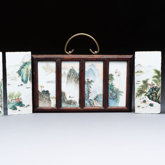 A set of four Chinese famille rose 'Landscape' plaques mounted in a wooden frame, signed Wang Yunquan 王雲泉, together with four plaques, 20th C.