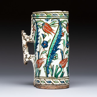 A polychrome Iznik mug, late 16th C.