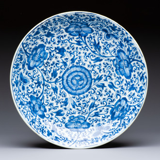 A large Chinese blue and white 'Peony Scroll' dish, artemisia leaf mark, Kangxi