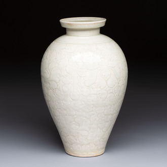 A Chinese qingbai 'Meiping' vase with incised floral design, Yuan or later