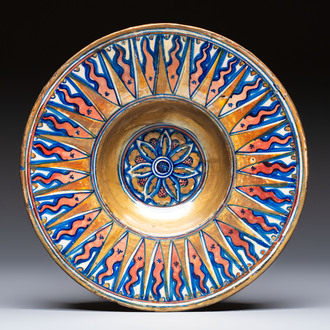 An Italian maiolica lustreware deep plate, Gubbio, 16th C.
