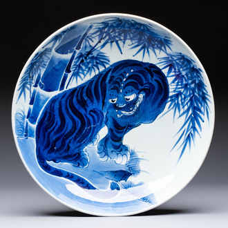 A large Japanese Arita blue and white 'Tiger' dish, Fuuki Chousun 富貴長春 mark, late Edo to early Meiji, 18/19th C.