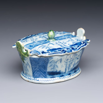 A blue and white Dutch Delft butter tub with green-glazed accents, 18th C.