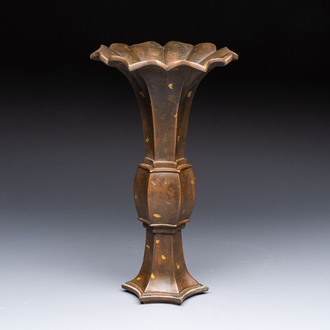 A Chinese gold-splashed bronze 'Gu' vase, Xuande mark, 17/18th C.