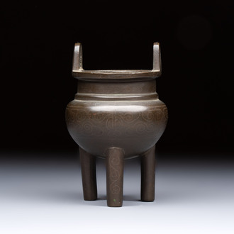 A Chinese silver-inlaid bronze tripod censer with clouds design, 19th C.