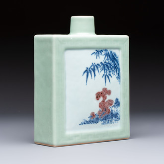 A Chinese blue, white and copper-red celadon-ground tea caddy with floral and bamboo design, Qianlong mark and of the period