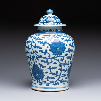 A Chinese blue and white vase and cover with floral design, Kangxi