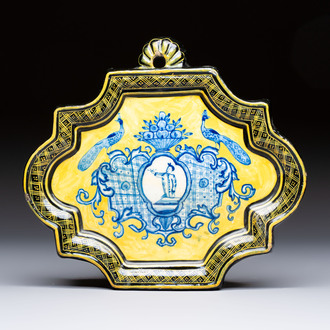 A rare blue and white yellow-ground Dutch Delft plaque with a black border, 18th C.
