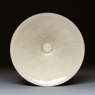 A Chinese qingbai tea bowl with incised floral design, 20th C.