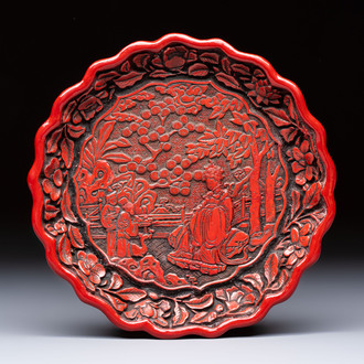 A fine Chinese red cinnabar lacquer flower-shaped 'Xi Wang Mu 西王母' dish, Ming