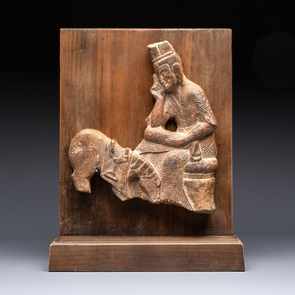 A Chinese sandstone 'Bai Ma Shi Zu 白馬舐足' carving, Northern Wei