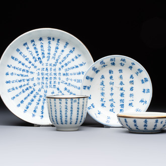 A Chinese blue and white 'Calligraphic' plate, a saucer, a box and a cup for the Thai market, Bao Zhu Li Ji 寶珠利記 and Man Tang Fu Ji 滿堂福記 mark, 19th C.