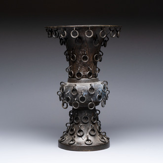 A Chinese archaistic bronze 'Zun' vase with 99 rings, 18/19th C.