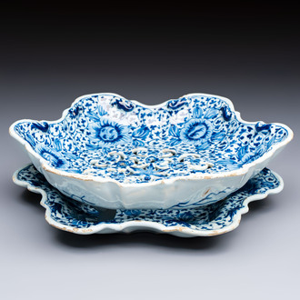 A fine blue and white Dutch Delft strawberry strainer and stand, 18th C.