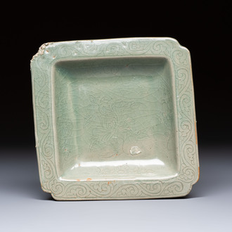 A fine Korean celadon square dish with incised floral design, Goryeo, 12th C.