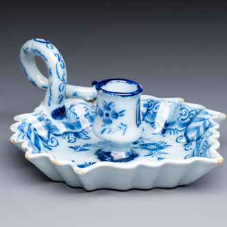 A blue and white Dutch Delft leaf-shaped chamberstick, 18th C.