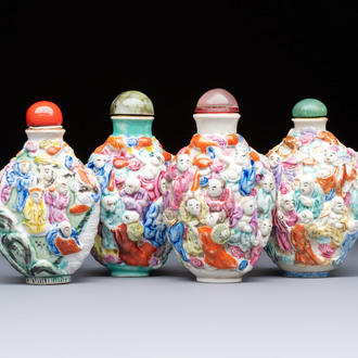 Four Chinese famille rose moulded 'Luohan' snuff bottles, Qianlong marks, 19th C.