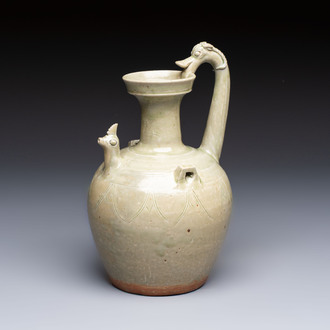 A fine Chinese Yueyao green-glazed chicken-head ewer with dragon-form handle, Southern Dynasties