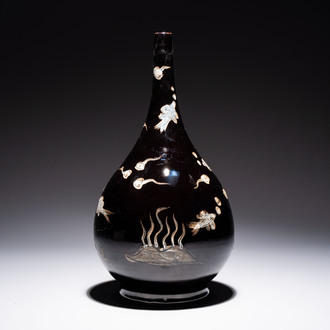 A Chinese black-glazed reverse-decorated bottle vase, 20th C.