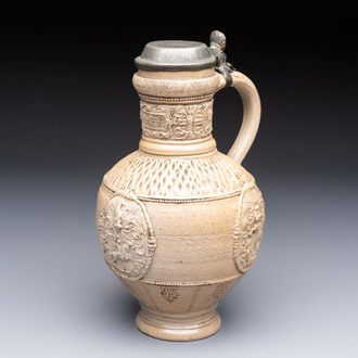 A Siegburg stoneware jug with mounted pewter lid, dated 1594