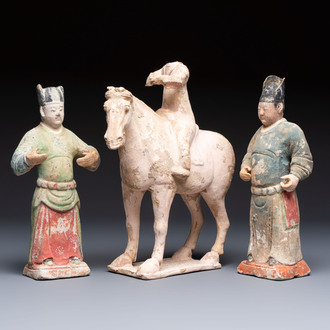 Three Chinese polychrome pottery figures, Sui/Ming