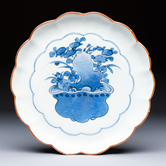 A Japanese Arita blue and white 'Bonsai' plate, Fuku mark, Edo, 17th C.