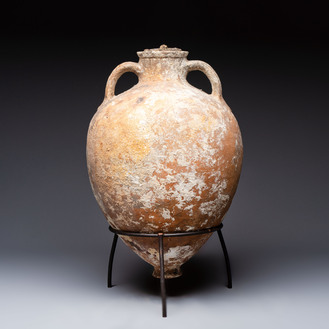 A Roman pottery olive oil transport amphora with original cover, South of Spain, 1st/3rd C.
