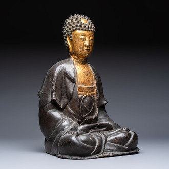 A large Chinese gilt-lacquered bronze Buddha, 17th C.