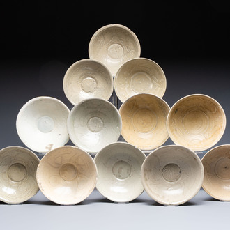 A group of 12 Chinese celadon-glazed bowls with incised floral design from the Jepara shipwreck, Fujian kilns, Song