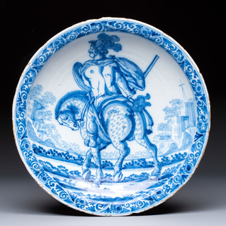 A blue and white Dutch Delft 'Titus Manlius' dish, after an engraving by Hendrick Goltzius, late 17th C.