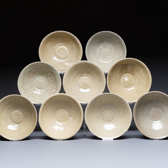 A group of nine Chinese celadon-glazed bowls with incised floral design from the Jepara shipwreck, Fujian kilns, Song
