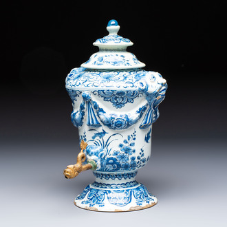 A blue and white Dutch Delft urn-shaped table fountain and cover, early 18th C.