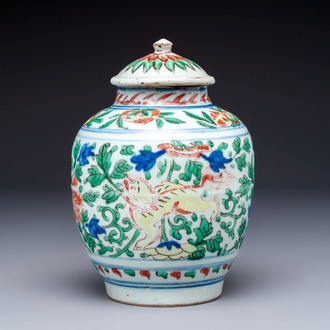 A Chinese wucai ‘Buddhist Lion’ vase and cover, Transitional period
