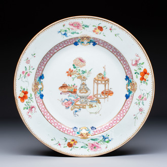 A Chinese famille rose gilt-decorated 'Antiquities' plate, Yongzheng