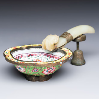 A Chinese celadon jade belt hook mounted as a handle on a Canton enamel bowl, Qing