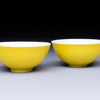 A pair of fine Chinese lemon-yellow-glazed tea bowls, Yongzheng mark, 19th C.
