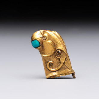 A rare Chinese turquoise- and glass-inlaid gold fitting in the form of a parrot, Han