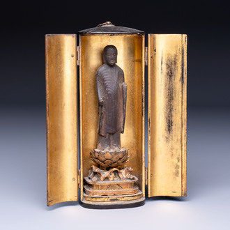 A small Japanese gilt-lacquered wooden zushi shrine with a carved wooden monk, probably Edo, 18/19th C.
