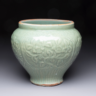 A fine large Chinese Longquan celadon 'Floral' jar, Ming