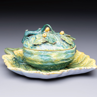 A polychrome Dutch Delft melon-shaped tureen and cover on leaf-shaped stand, 18th C.