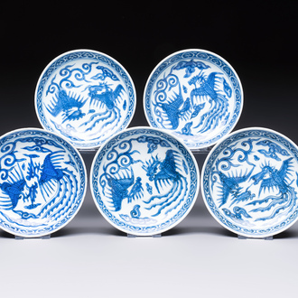 Five Chinese blue and white 'Phoenix' saucers, Wanli mark and of the period