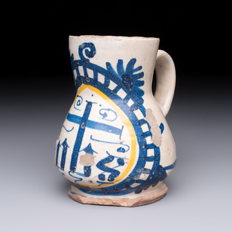 A very rare polychrome Antwerp maiolica 'IHS' jug, 16th C.