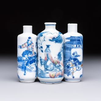 Three Chinese blue, white and copper-red snuff bottles with narrative design, 19th C.