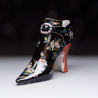 An extremely rare black Delftware model of a shoe, early 18th C.
