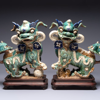 A pair of large Chinese polychrome-glazed Shiwan stoneware Buddhist lions, 19th C.