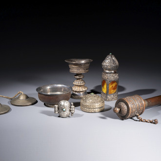 A varied collection of seven Tibetan ritual utensils, including a turquoise-inlaid silver relic holder, 19/20th C.