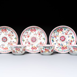 Three Chinese famille rose 'Birds and Plum Trees' cups and saucers, Yongzheng